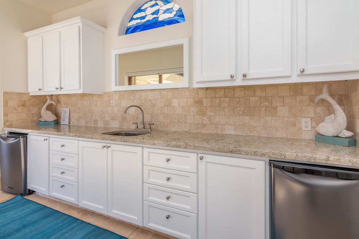 Located on the 2nd floor of the house between the 2 Master King Bedrooms