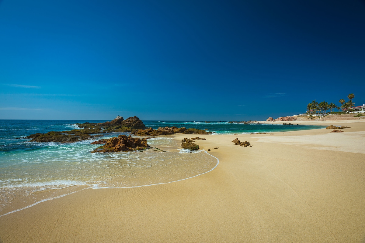 Beachfront sand and waves near Villa Tortuga in Punta Bella, Los Cabos.