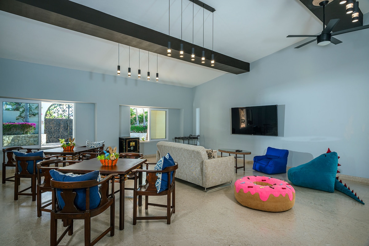 Family living room with TV at Villa Tortuga, Punta Bella, Los Cabos.