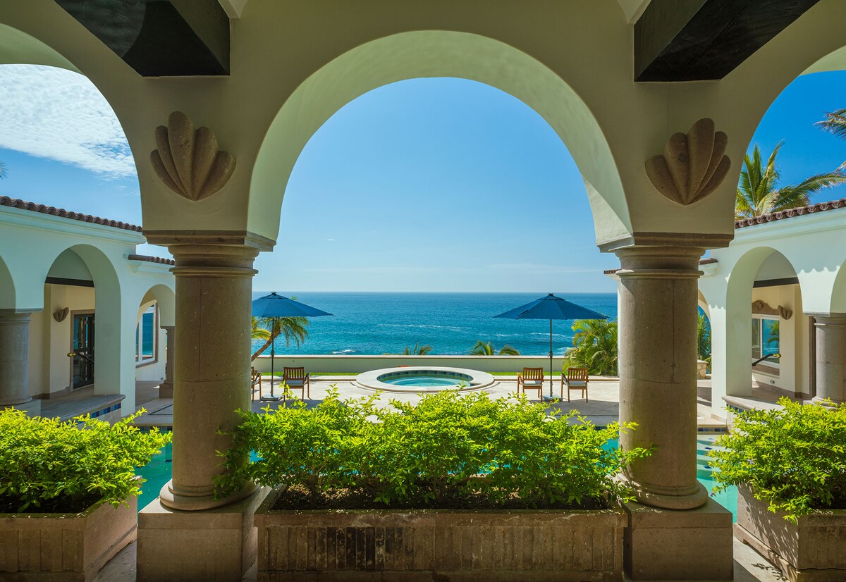Arched terrace with ocean views at Villa Tortuga in Punta Bella, Los Cabos.