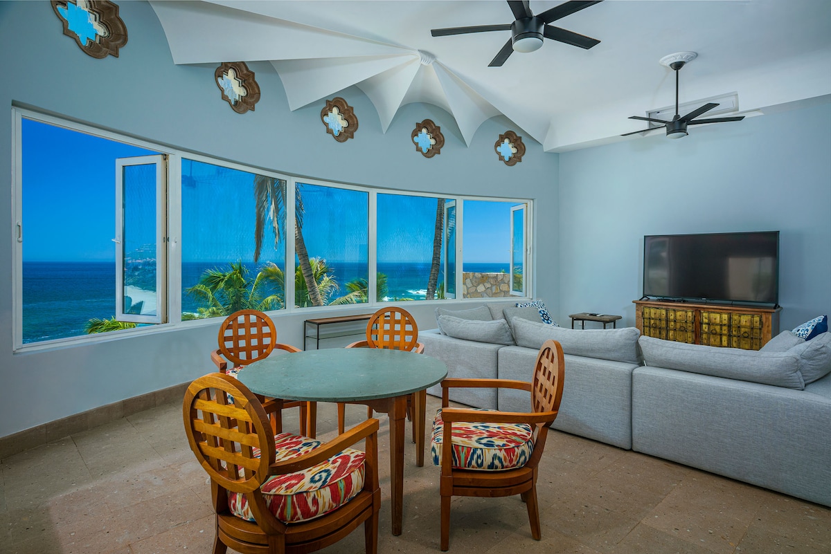 Living room with ocean views at Villa Tortuga in Punta Bella, Los Cabos.