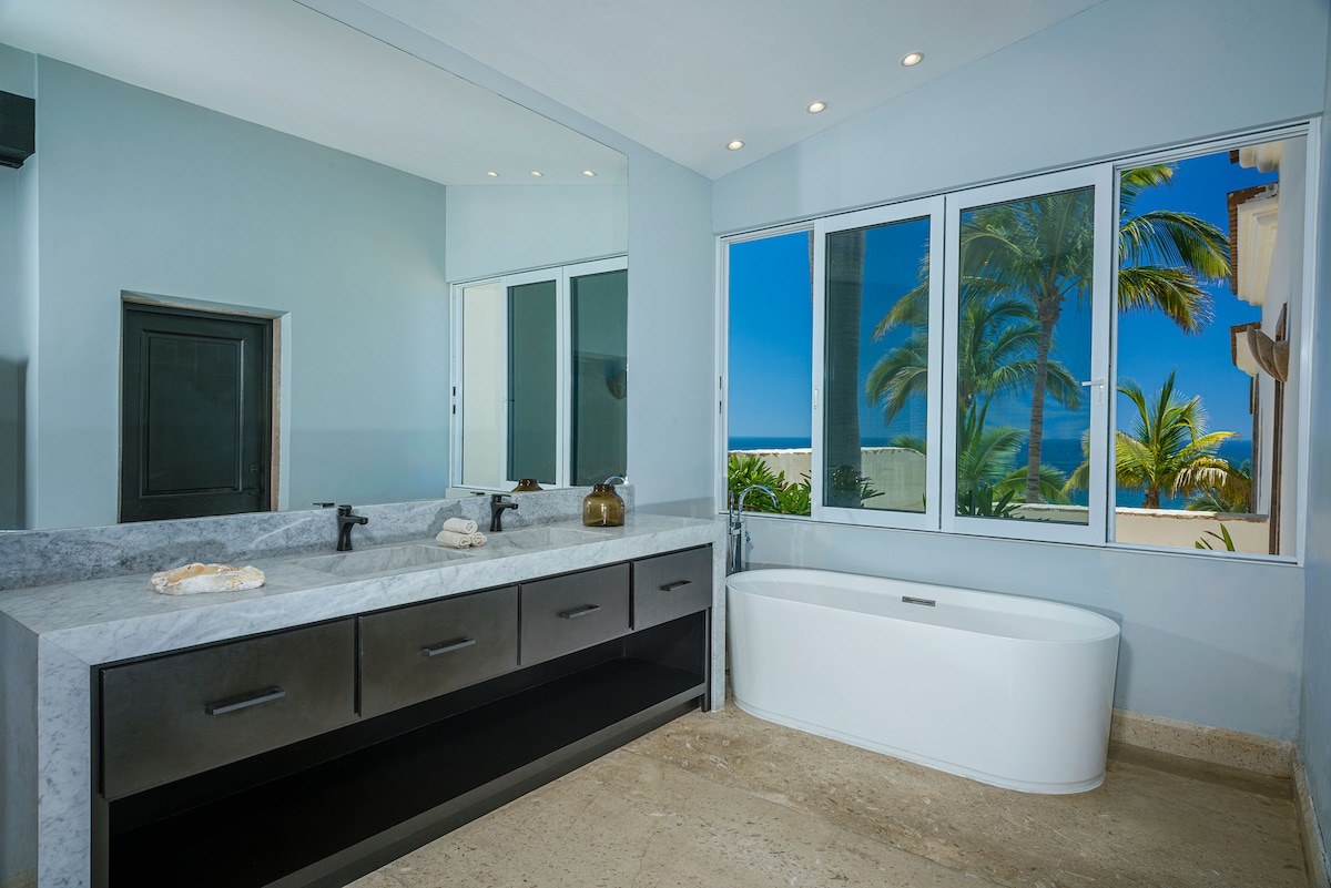 Ocean-view bedroom at Villa Tortuga in Punta Bella, Los Cabos.