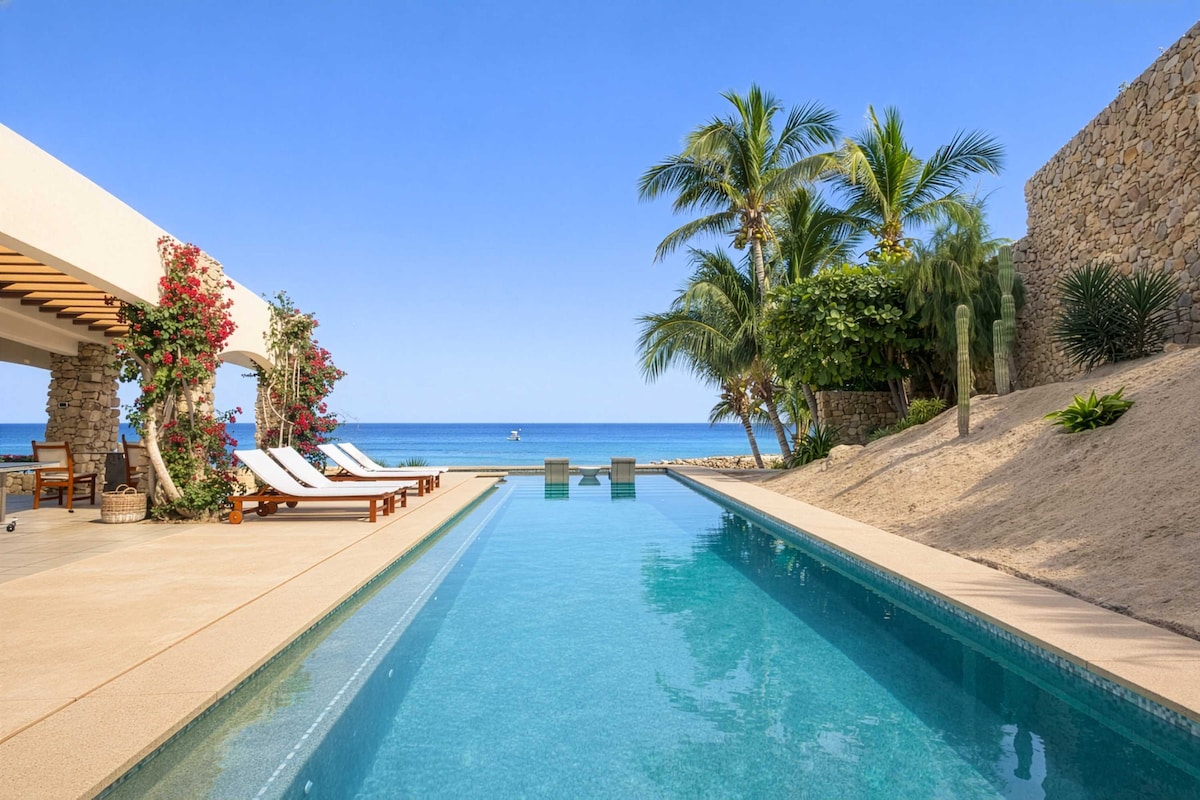 Sleek infinity pool stretching toward the Sea of Cortez — pure serenity.