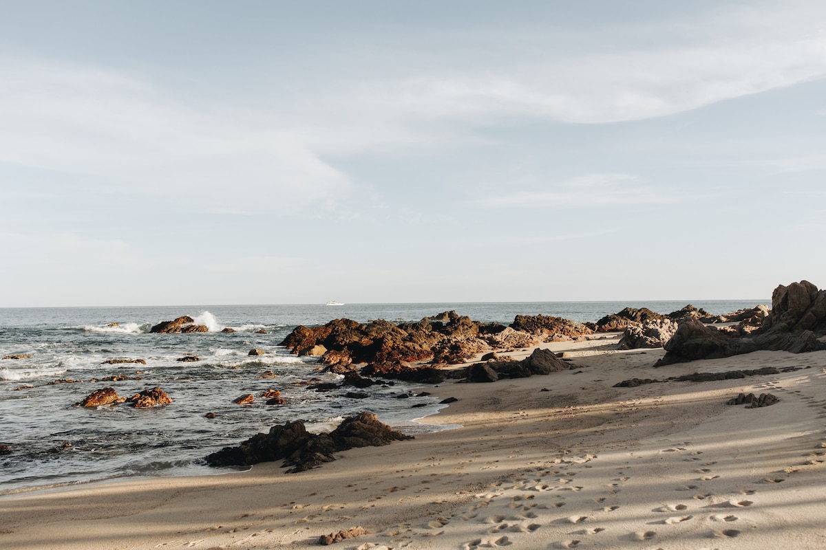 Walking around the point to the beautiful Punta Bella Bay