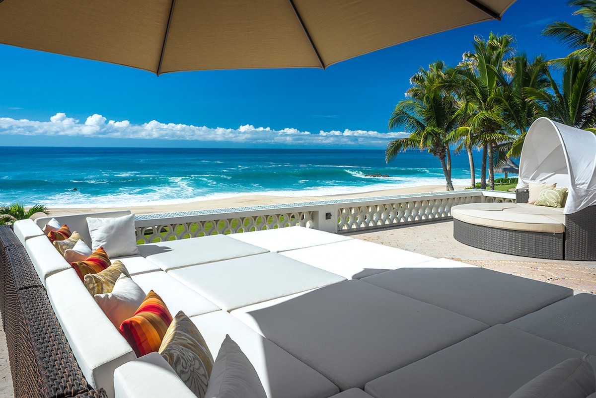 Shaded daybeds on the terrace overlooking the Sea of Cortez at Casa Edwards, Palmilla, Los Cabos