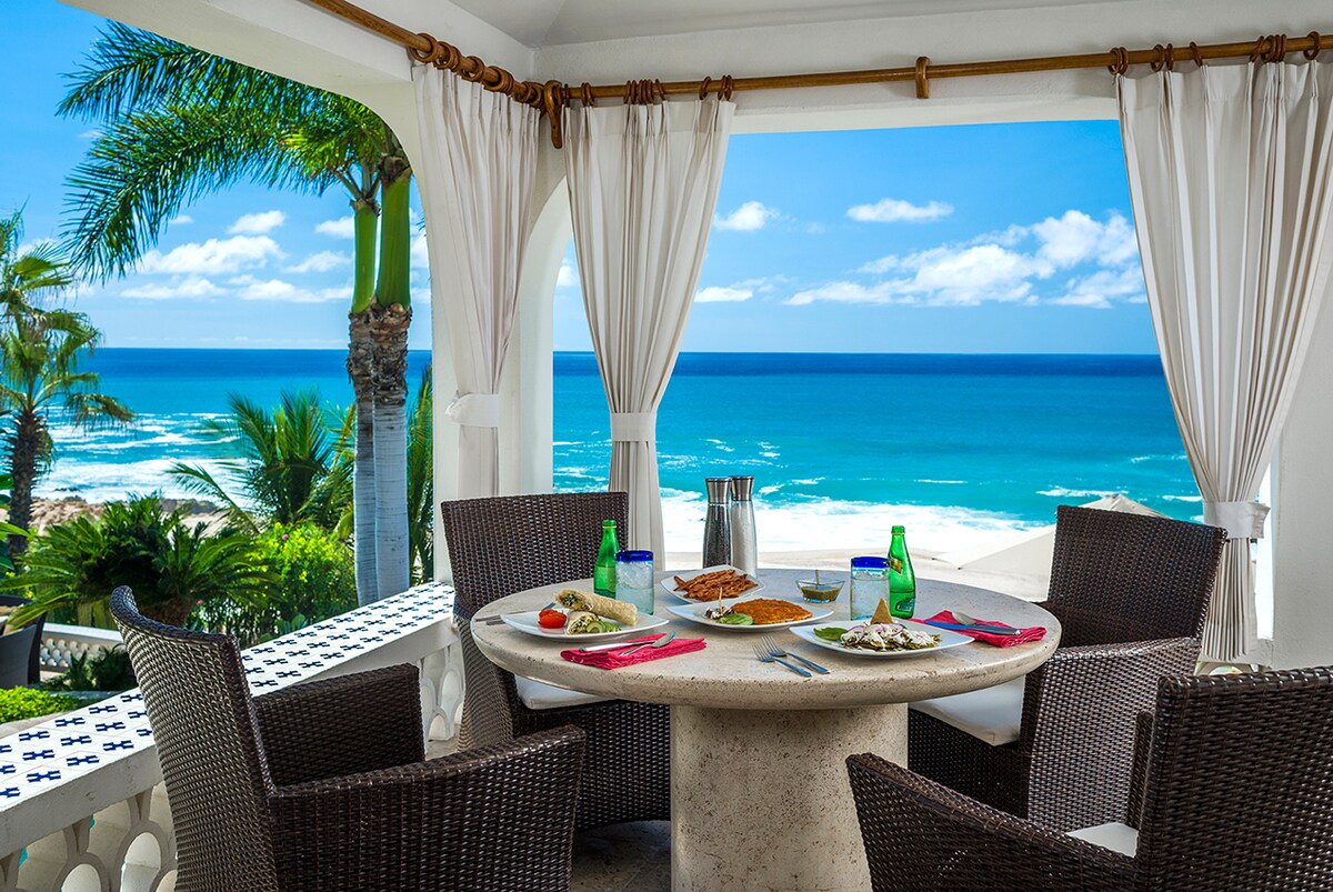 Table set for breakfast in the oceanfront cabana at Casa Edwards, luxury villa in Palmilla, Los Cabos