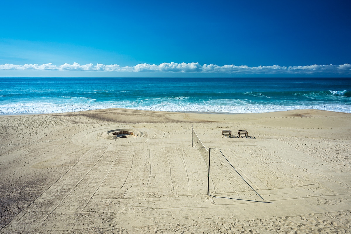 Beach fire pit set into the sand in front of Casa Edwards, beachfront luxury villa in Palmilla, Los Cabos