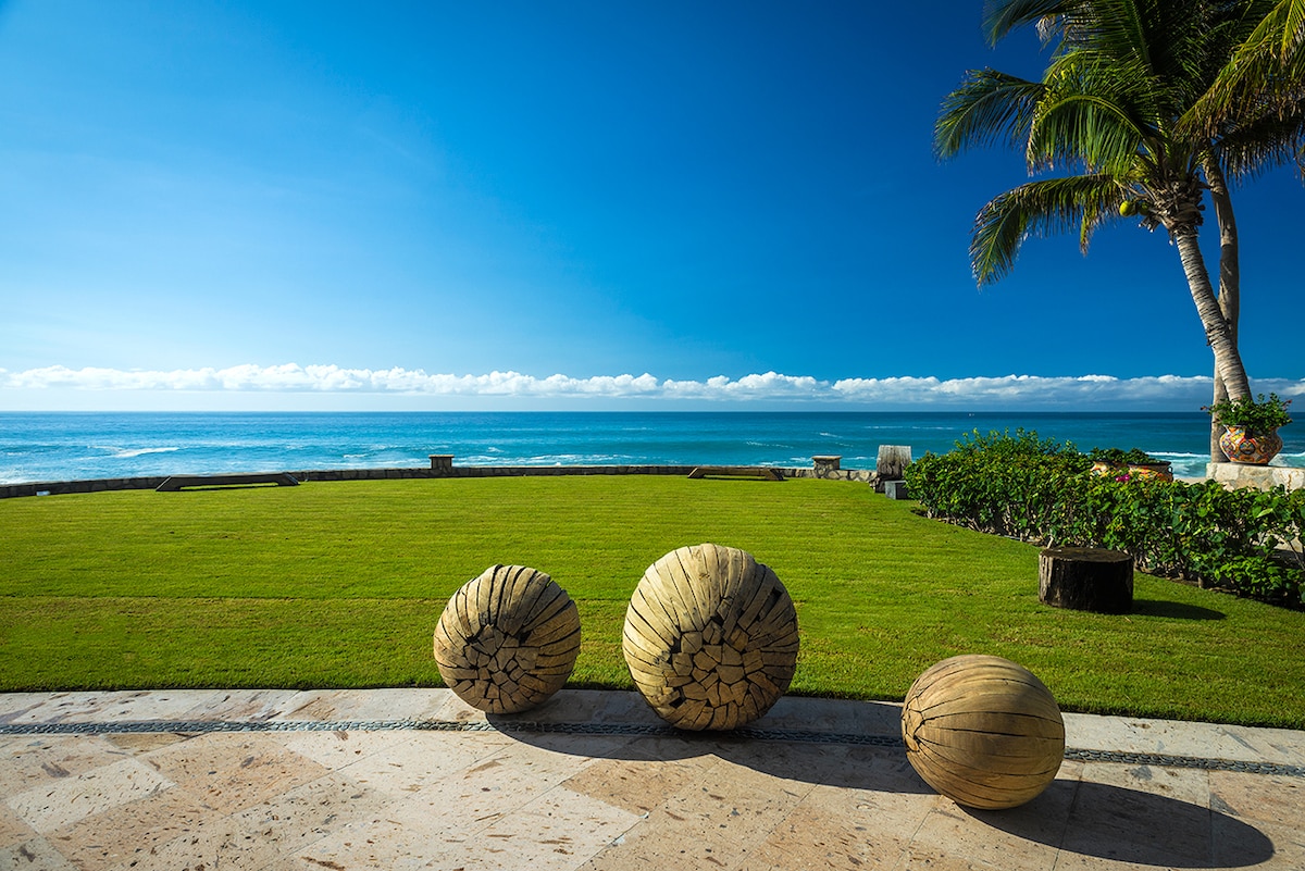 Large oceanfront lawn used for weddings and private events at Casa Edwards, Palmilla, Los Cabos